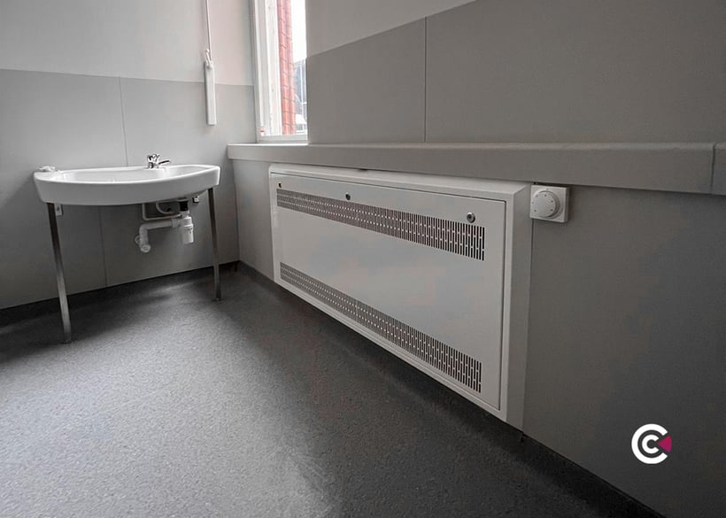 how to clean behind a radiator