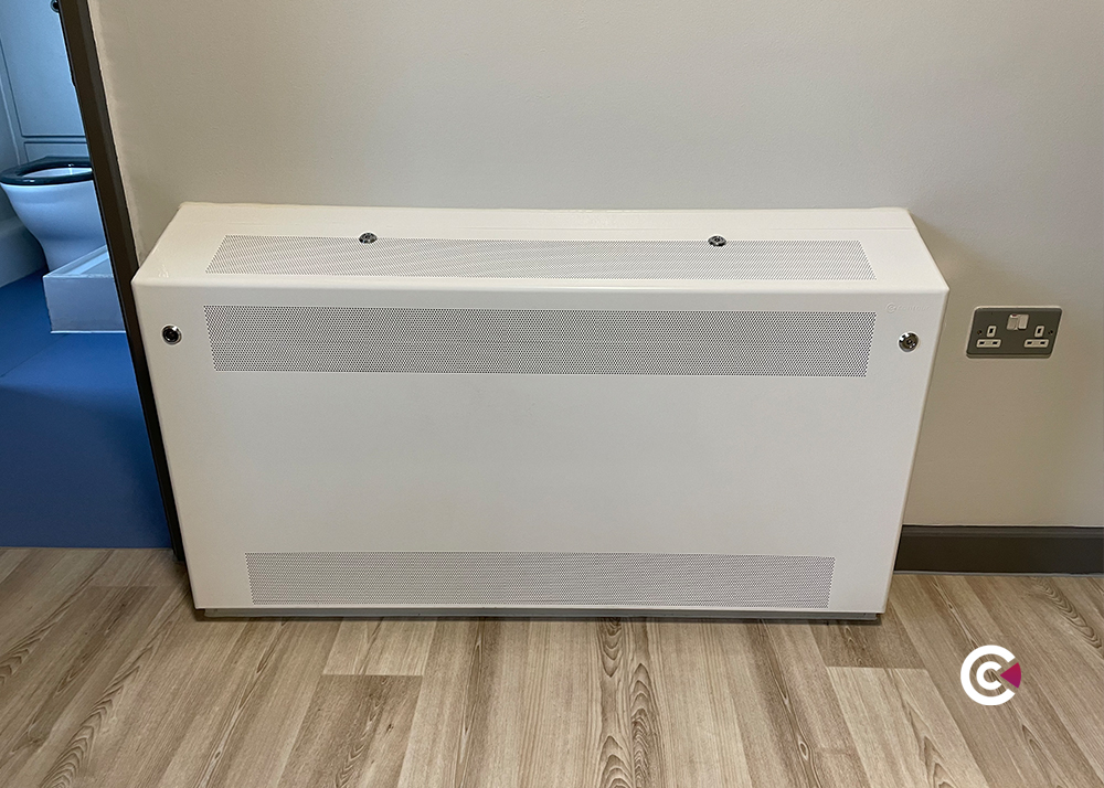 how to clean behind radiator