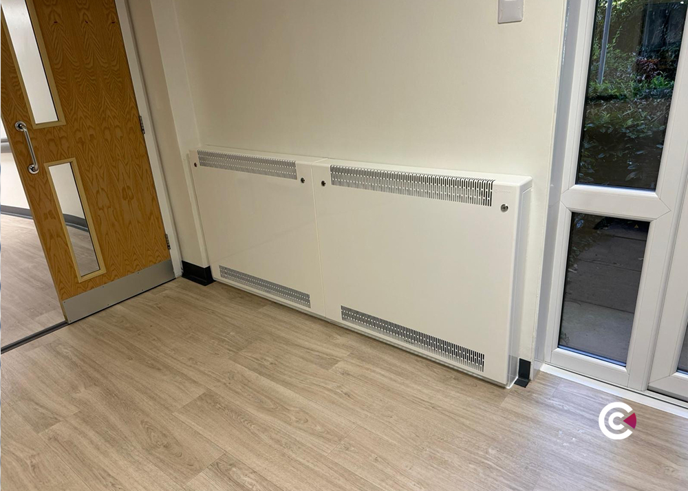 how to clean behind radiators