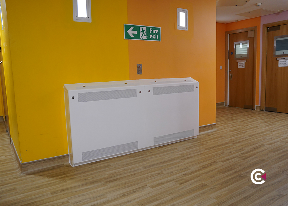 how to clean behind radiators